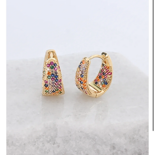 Gold hoop earrings with colorful gemstones on a white background