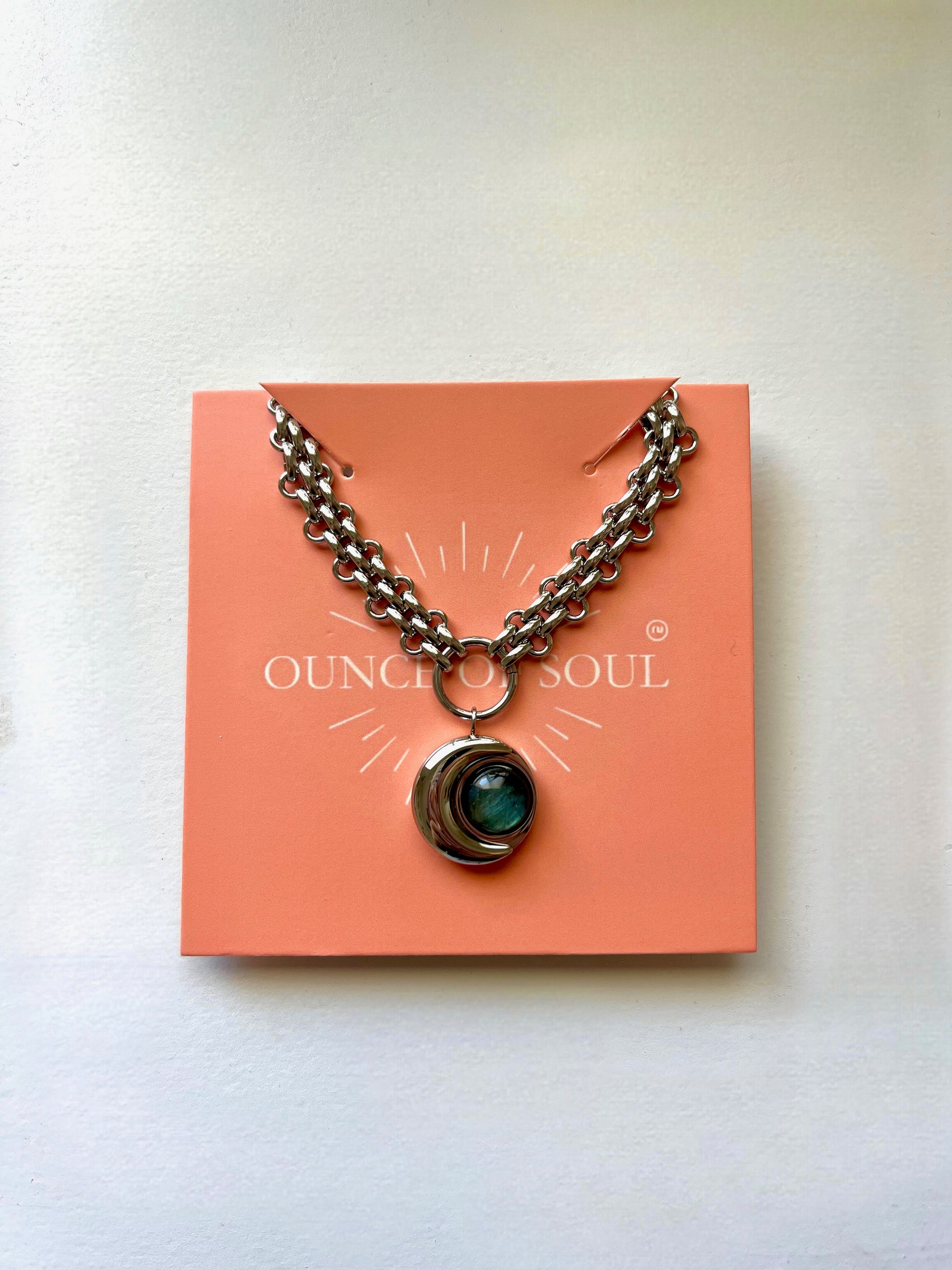 moon cresent Necklace with a pendant on an 'Ounce of Soul' branded card against a white background