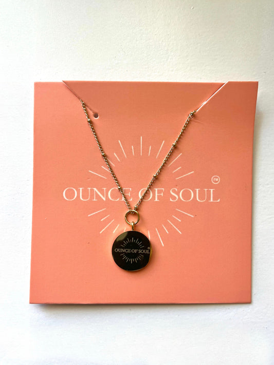 ounce of soul logo Necklace on a pendant on an 'Ounce of Soul' branded card.